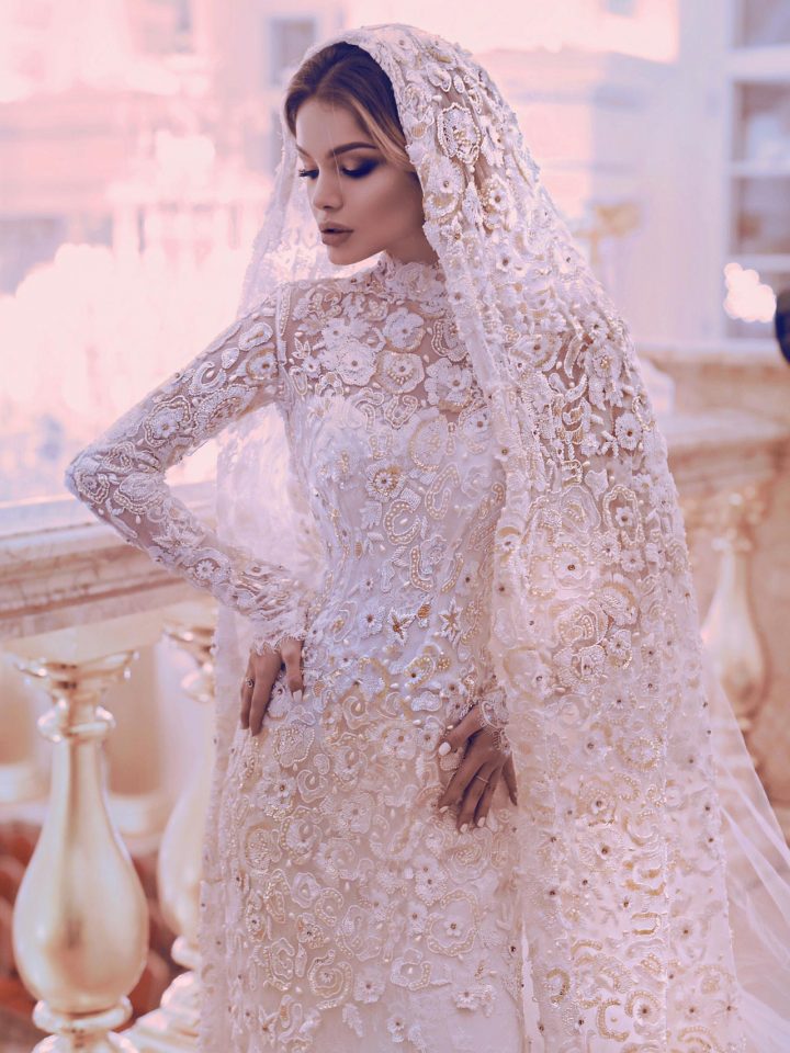 Кружевное закрытое свадебное платье с рукавами